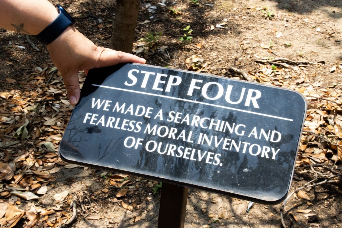 These signs at the Greenhouse Treatment Center tell the 12 steps to overcome addiction found `in “Alcoholic’s Anonymous.”