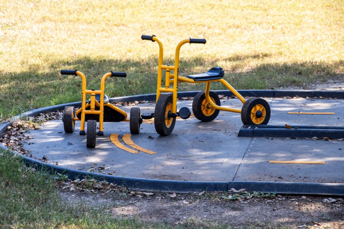 NE Campus Children's Center outside 0playground includes different toys for the kids to use.