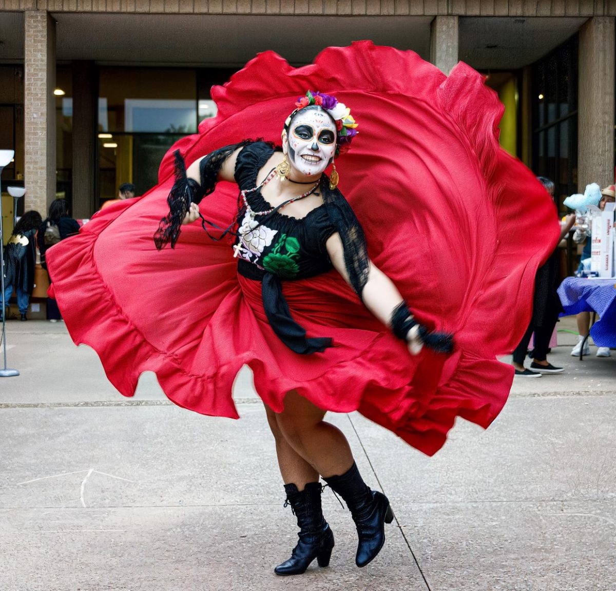 NE Campus student and dance club member Emily Reyes performs a self-made ballet folklorico routine during Fall Fest. She has been dancing since she was three.