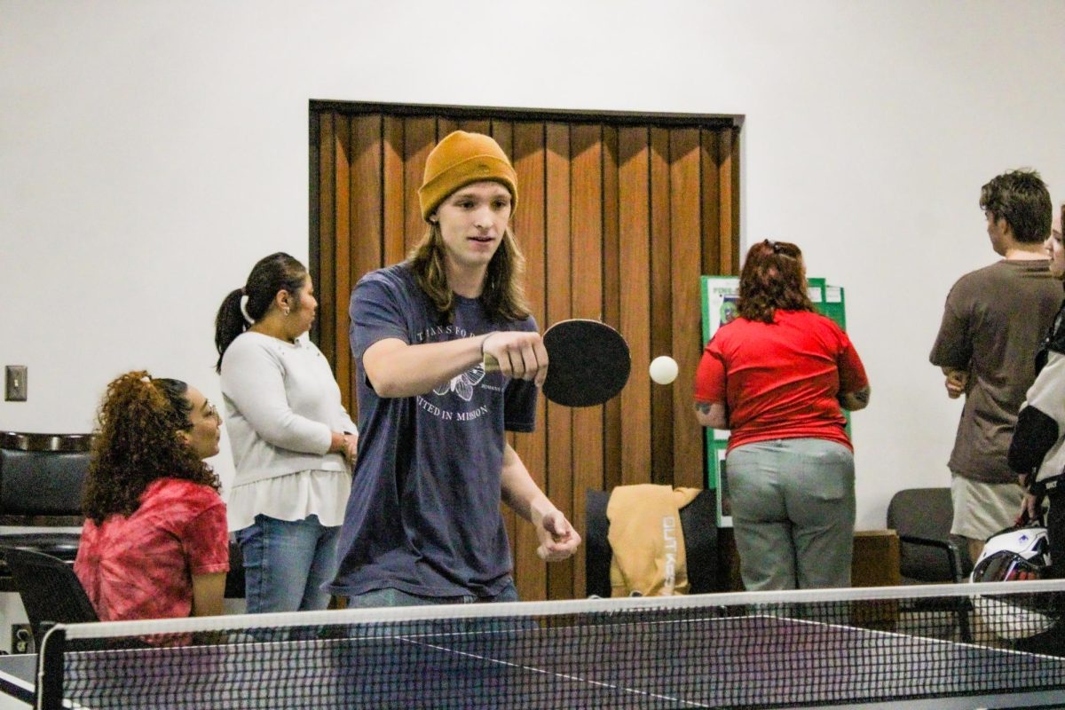 NE student Waylon Shinn secures his first place spot in the ping pong tournament.