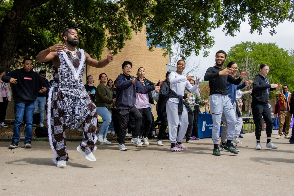 Bandan Koro member Terrance Thomas taught students a series of traditional dances.