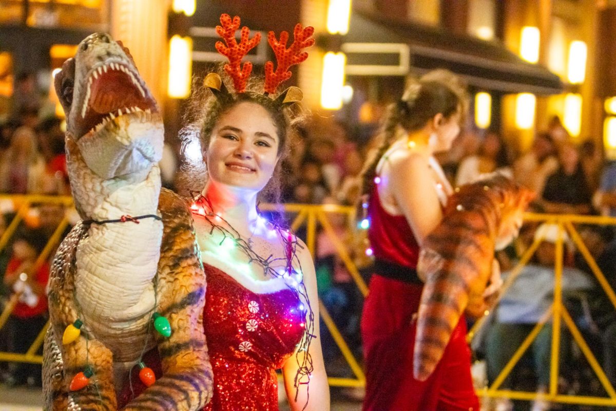 Fort Worth's Dinosaur Land had not only a float but people walking along the sides with dinosaur puppets interacting with the crowds.