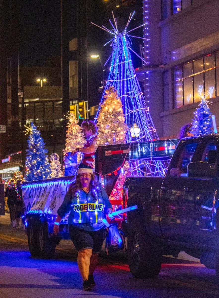 Fort Worth Police Department's Code Blue Citizen's on Patrol unit also had a float including a tree made of blinking blue lights.