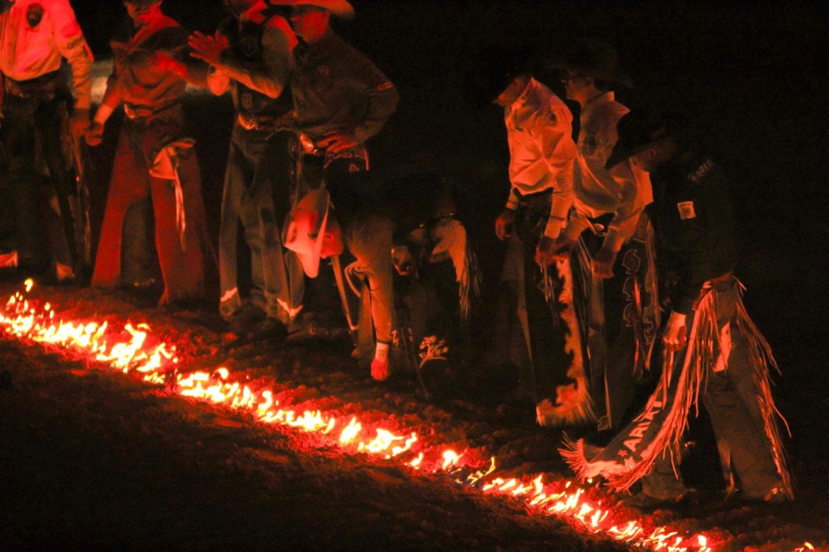 Before the competition, a line of fire was lit and each bull rider was introduced.