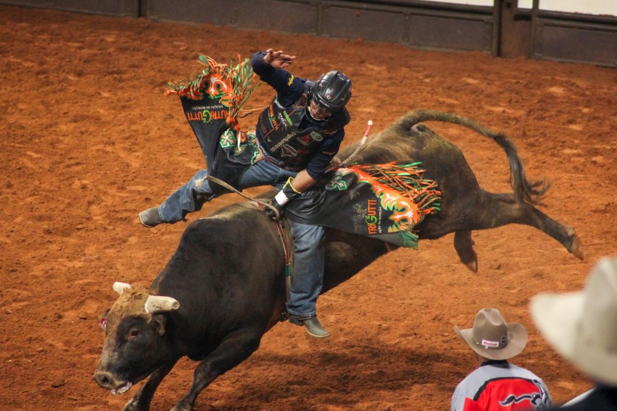 Rogério Silva Venâncio rides bull “Walk Hard.” Venâncio placed eighth overall and won $3000. For this ride he got 86.75 points.