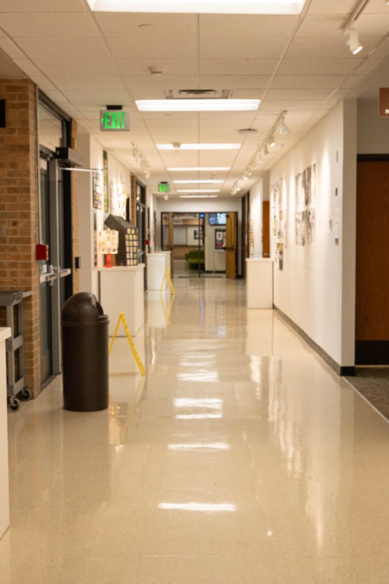 The hallway in the NE art department is used to display students' work.