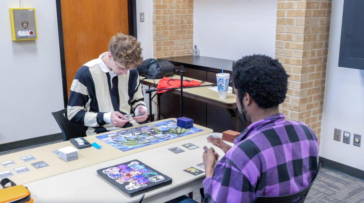 NE Students Nicholas Taylor and Alexander Tidwell playing Magic: The Gathering.