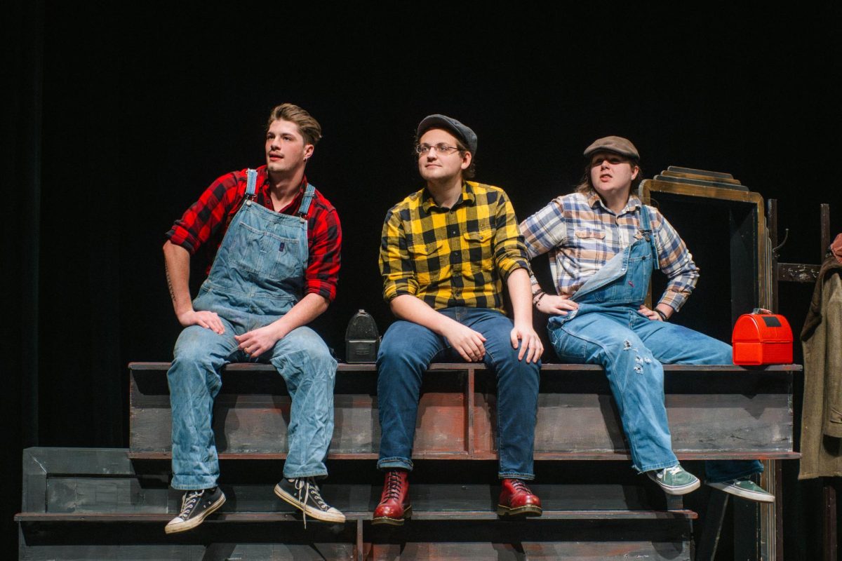 Zach Zare, Shaye Klingen Smith and Julie Pruett perform "Mere Mortals," about three construction workers working on a skyscraper on South Campus.
