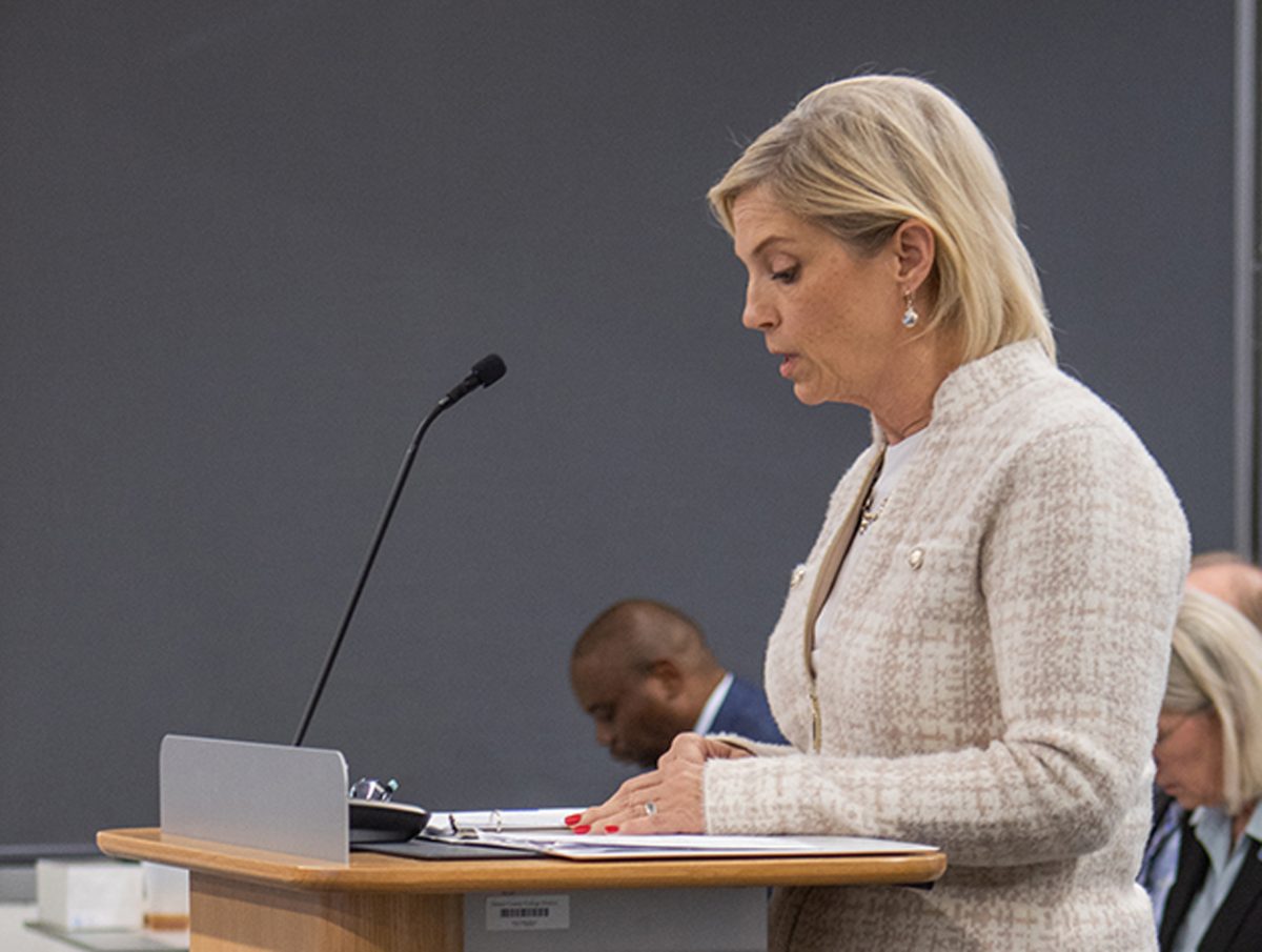 Shelley Pearson speaking to the board of trustees at meeting in Feb. about the increase of pay to adjunct faculty and staff.