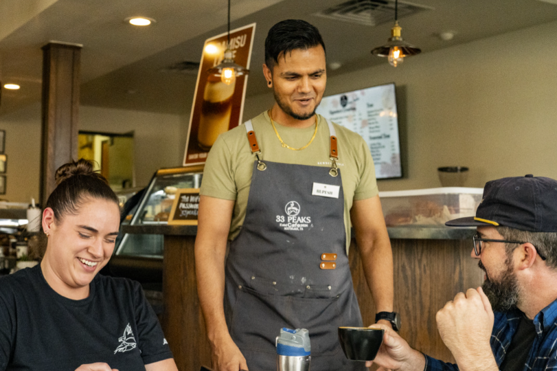 33 Peaks co-owner Rupesh Neupane talks with customers over a fresh cup of coffee in Southlake, just 20 minutes away from NE.
