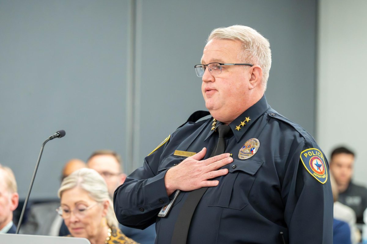 Chief of Police Jay Tillerson chokes up as he introduces himself to the Board of Trustees at their meeting on Jan. 22.