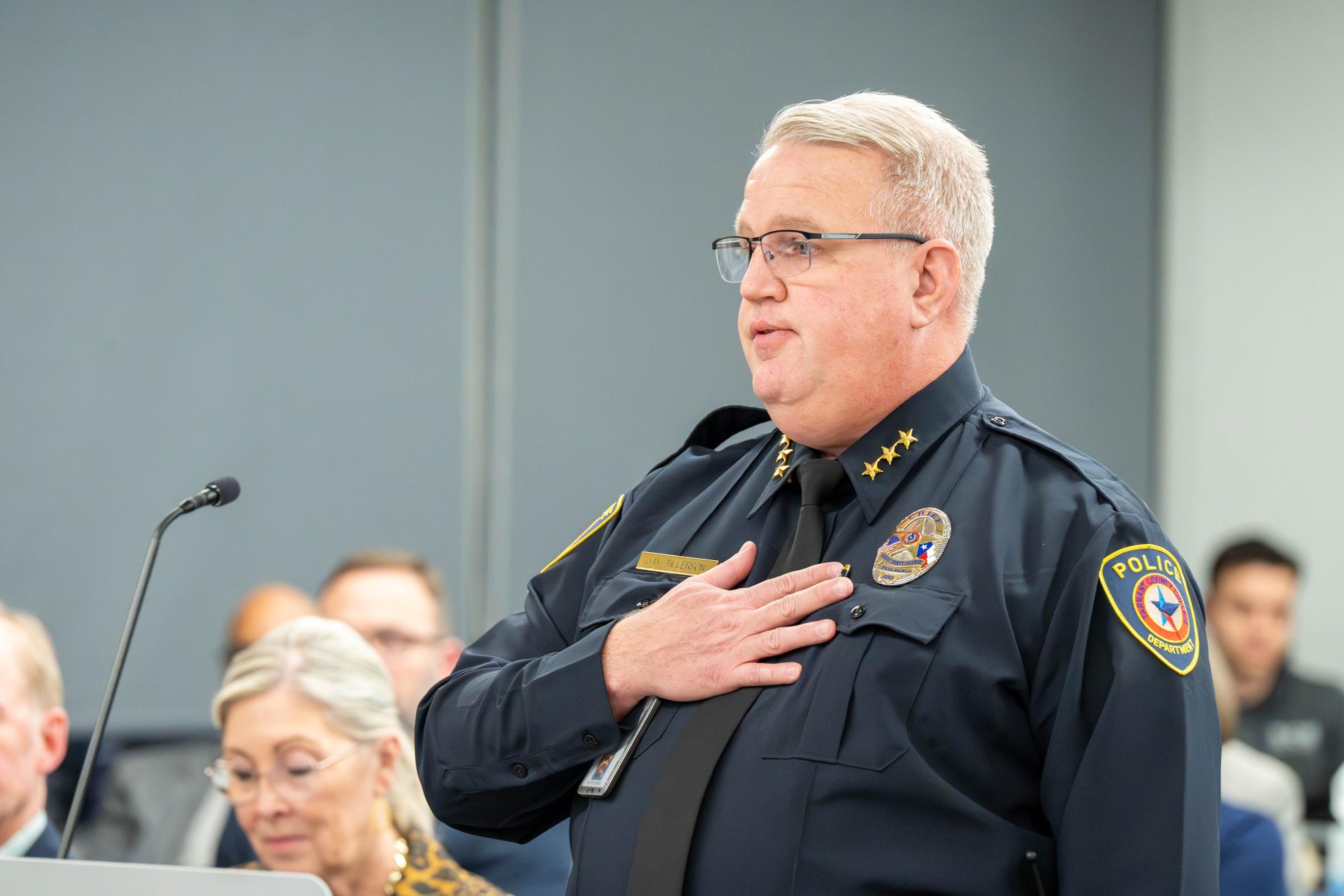 Chief of Police Jay Tillerson chokes up as he introduces himself to the Board of Trustees at their meeting on Jan. 22.