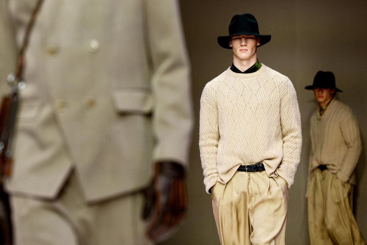 Models present creations from Giorgio Armani Fall-Winter 2026/2027 menswear collection during the Milan Fashion Week in Milan, Italy, January 19, 2026. REUTERS/Alessandro Garofalo