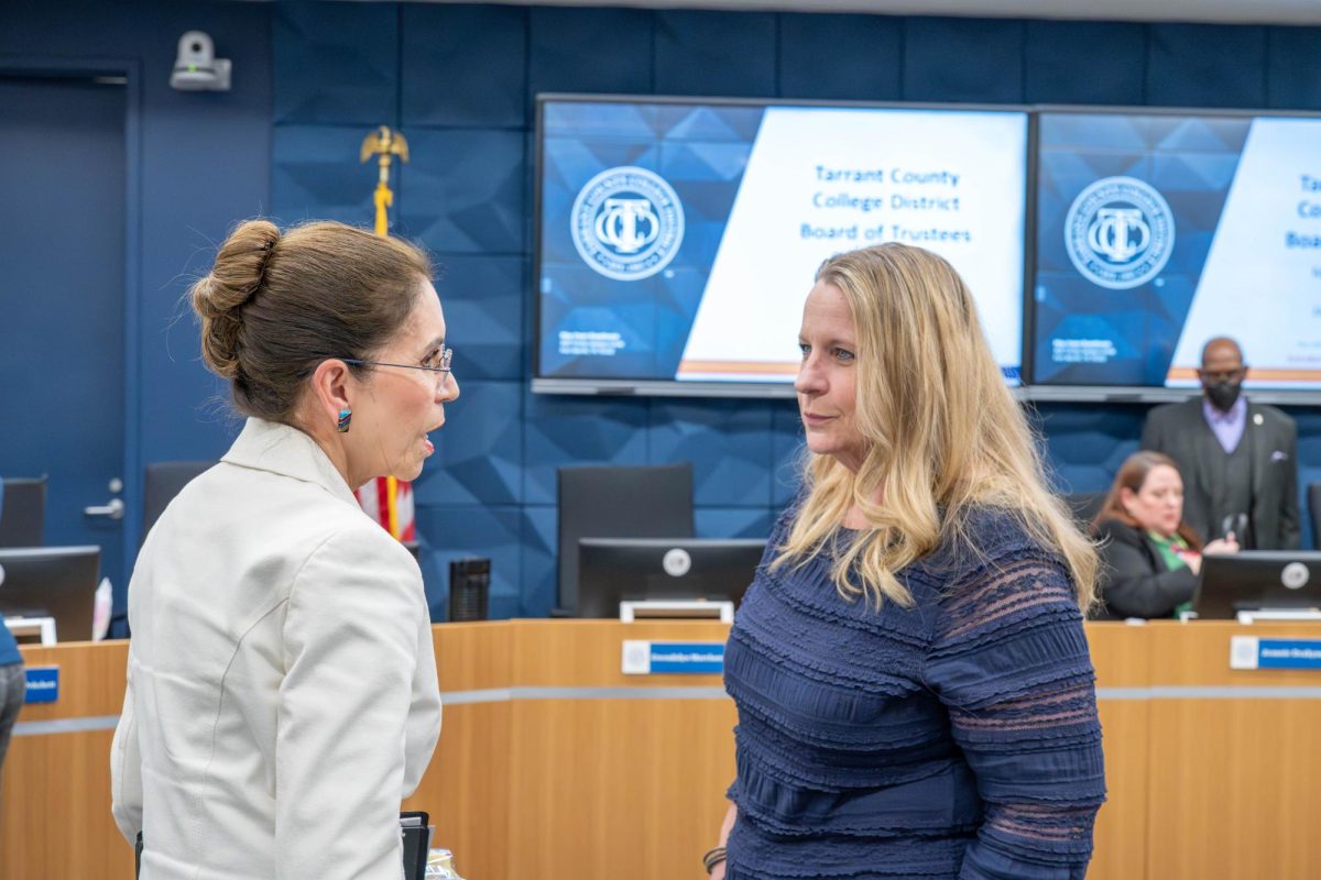 Chancellor Elva LeBlanc speaks to assistant secretary Laura Pritchett after the Jan. 22 board of trustees meeting. 