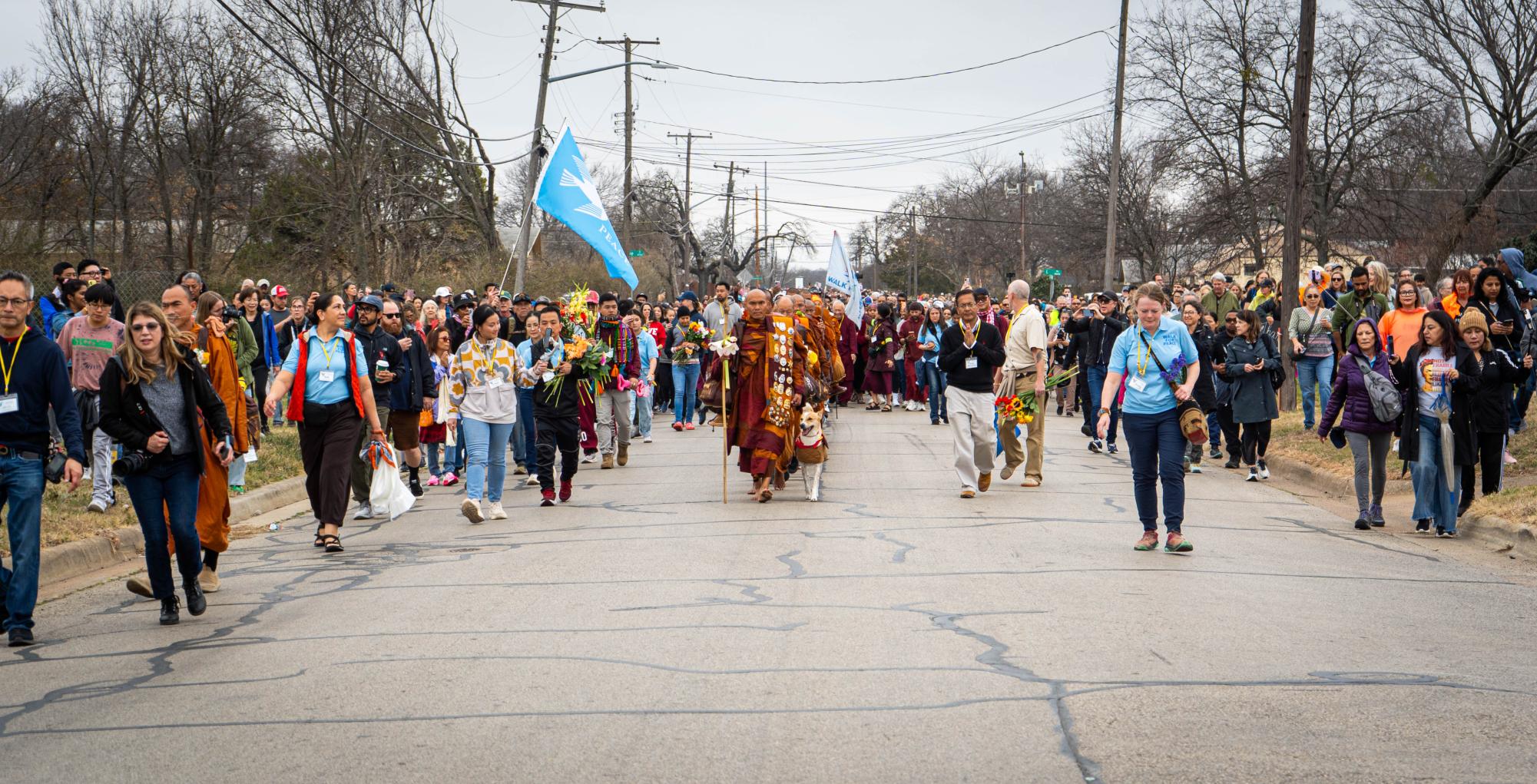 Theravada Buddhist monks and there 100 supporters walk back to the temple from there mile walk Feb.16. 