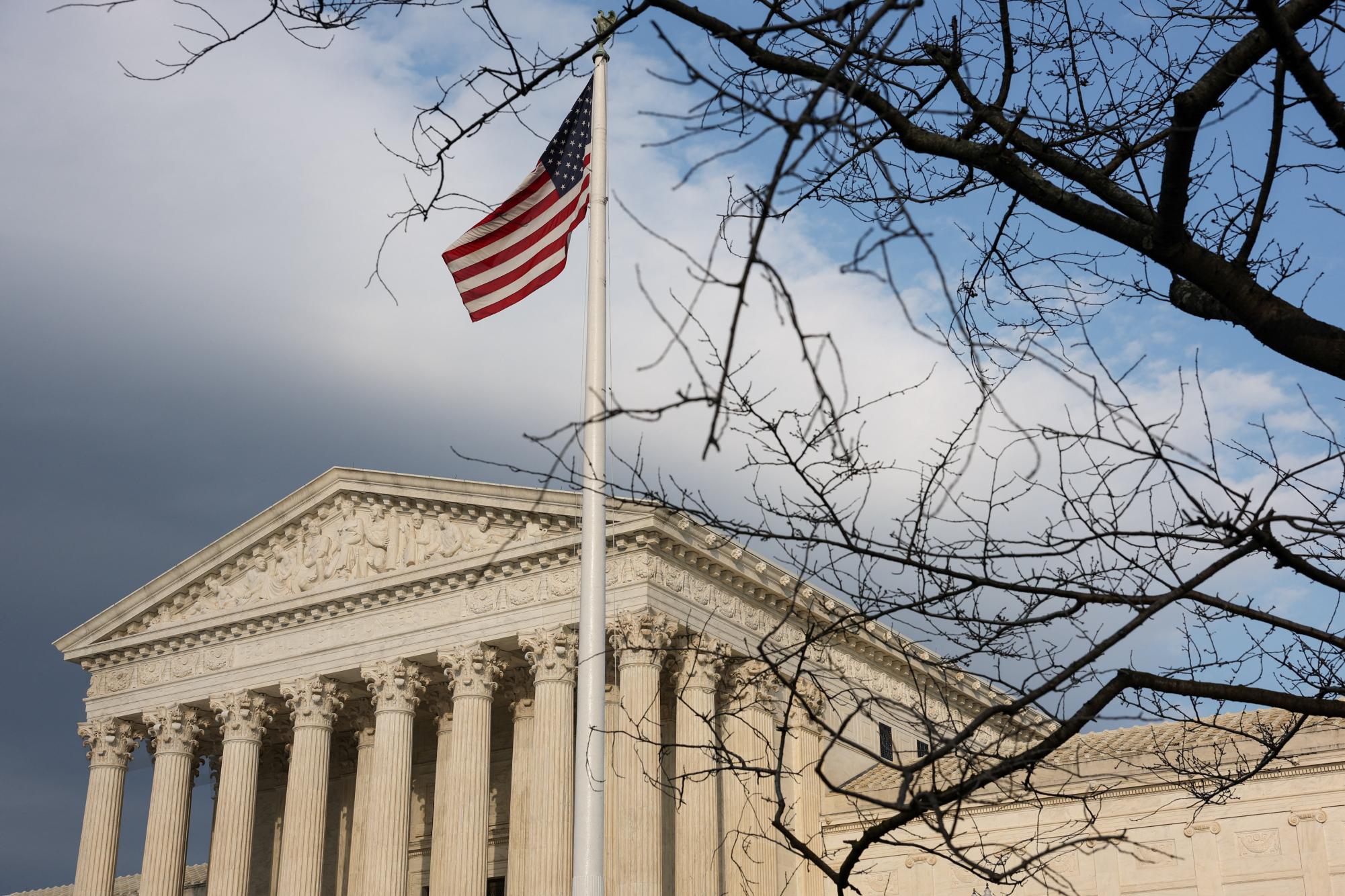 An American flag flies outside the U.S. Supreme Court in Washington, D.C., U.S., February 25, 2026. REUTERS/Kylie Cooper