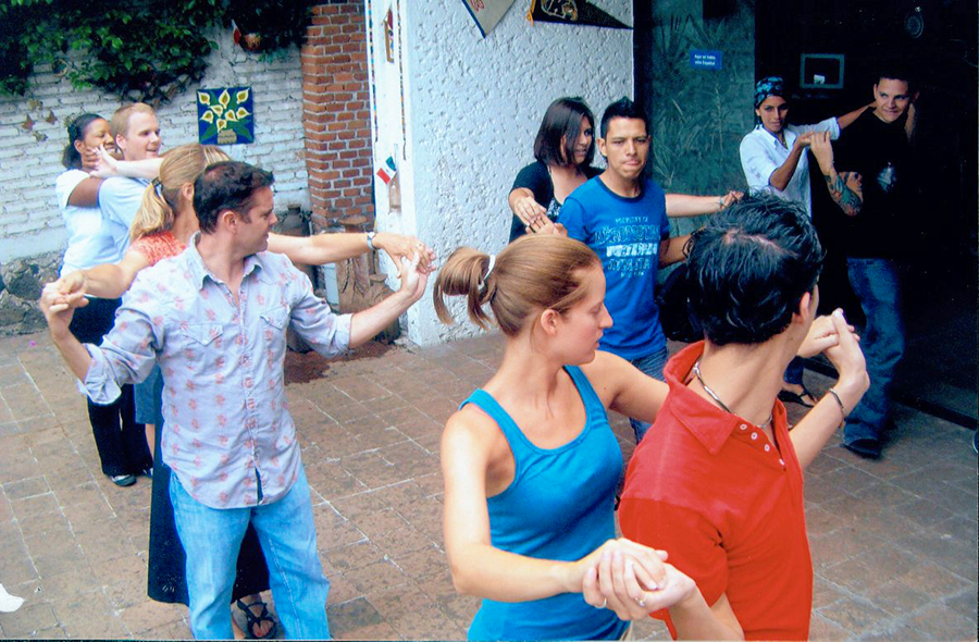 Instructors and students mix it up in a salsa dance class on study abroad trip to Mexico in 2012. 