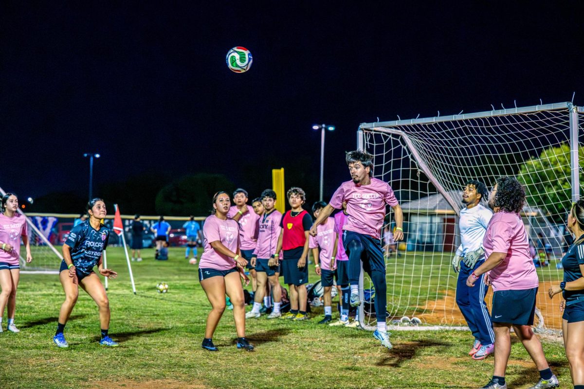 Juan Manriquez, player for NW Soccer Club, clears the ball with his head. 