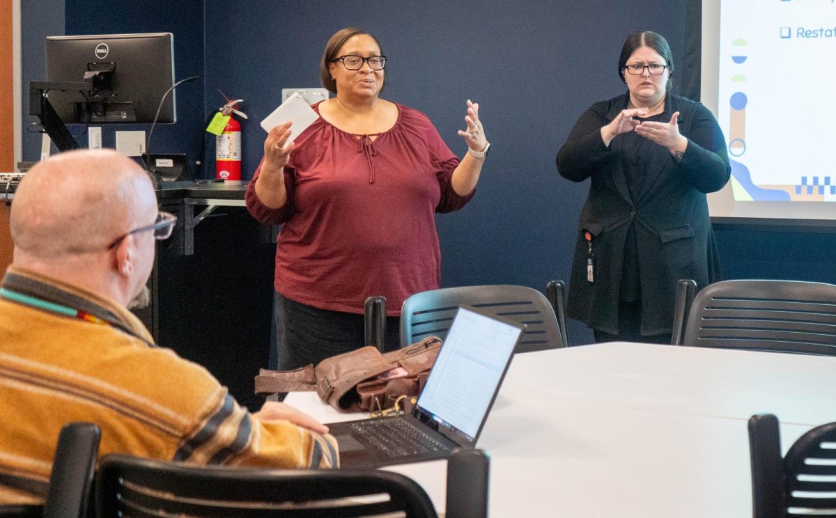 Ambrey Boswell, a TR student, translates to sign language what Tywanna Jones says about managing test anxiety. 