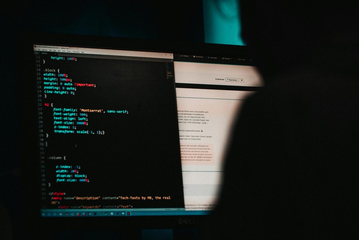 Someone programming a website in HTML.