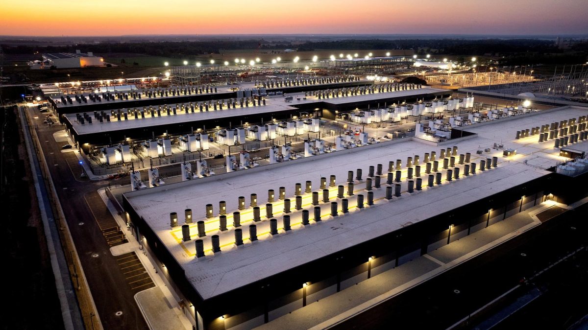 An Amazon Web Services AI data center lights up the sky in New Carlisle, Indiana.