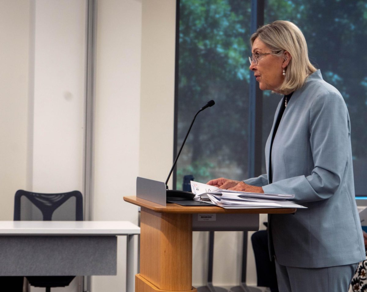 Pamela Anglin, chief financial officer, presents the budget for fiscal year 2027 to the board of trustees Aug. 13.