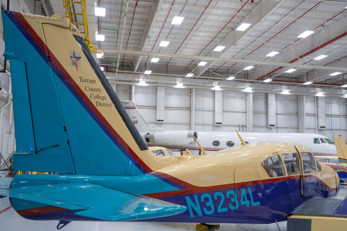 A Piper PA-23 displays the TCC logo and colors. The plane serves as an instructional tool for the NW aviation program.