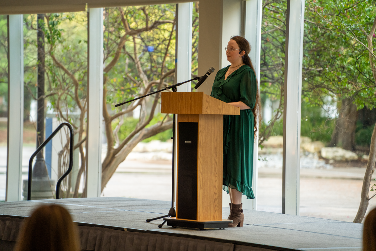 Cara Howard gives a speech after recieving an award for original dance choreography at the Script award ceremony on South Campus Sept. 11. 