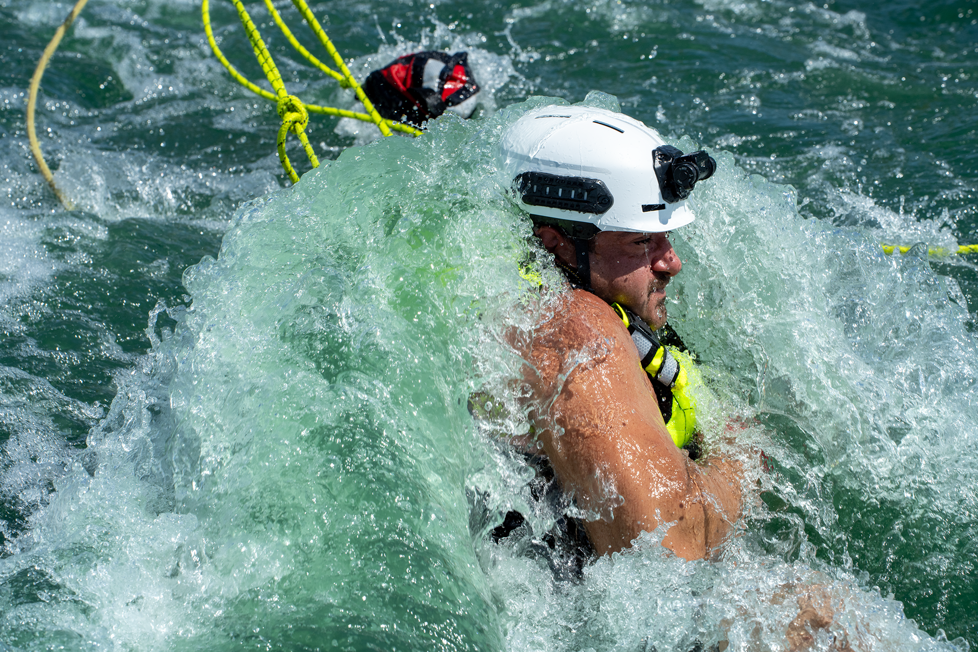 Firefighter tests an emergency rescue net at the NW Swiftwater rescue training course Sept. 15.