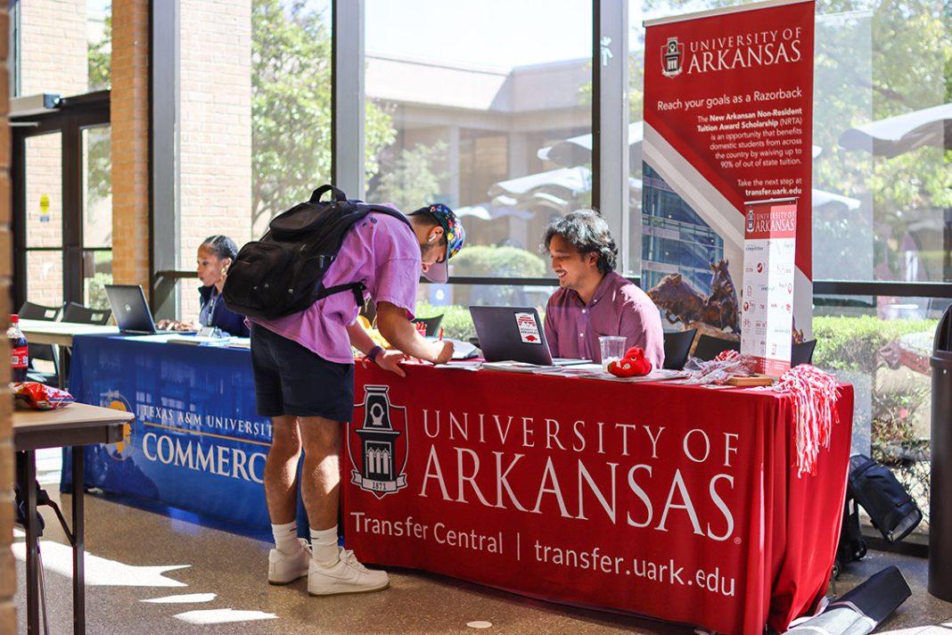 NE student Alfonso Quiroz at the University of Arkansas at the Road Trip fair in 2022.