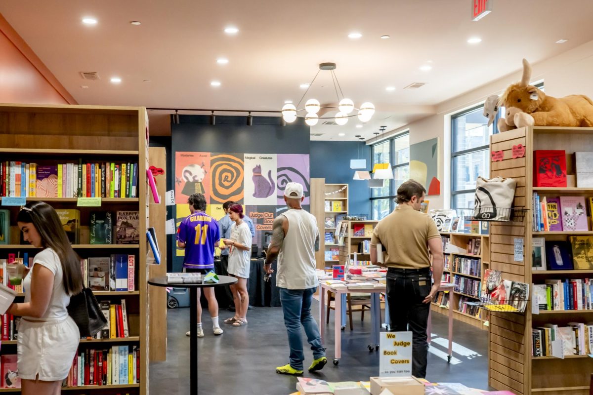 Customers browse indie book selections at Recluse Books Sept. 19. 