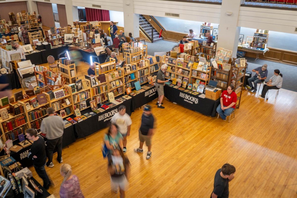 Customers visit the Fort Worth Antiquarian Book Show to purchase novels, magazines and illustrated books Oct. 24 at the 
Fort Worth Masonic Temple.