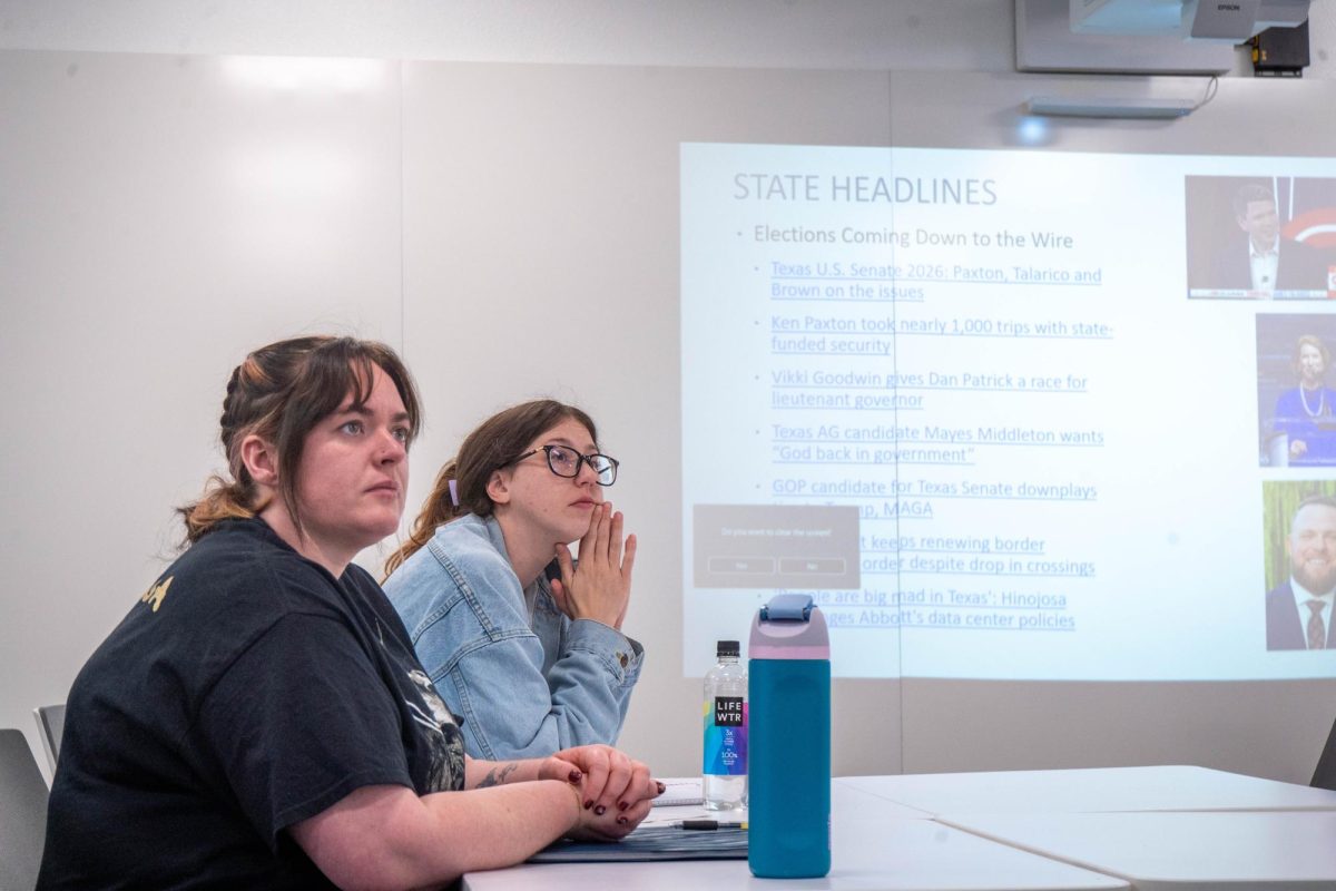 NE students Mallory Pfeifer and Hannah June participate in The News Forum discussion Oct. 15.